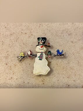 Sparkling White Snowman Brooch with Colorful Bird Accents